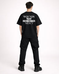 Wounds That Remember Mercy Oversized T-Shirt – Black